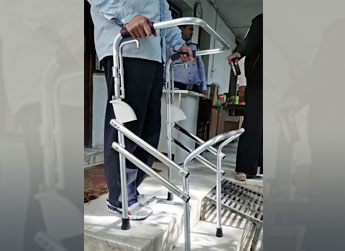 Modified walker with adjustable legs - Photo