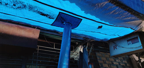 Image of Tarpaulin Shed with In-built Water Drain